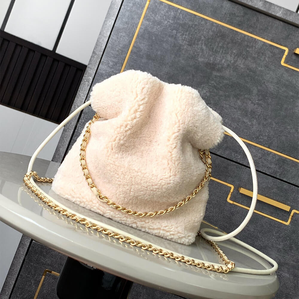 CHANEL 22 MINI HANDBAG